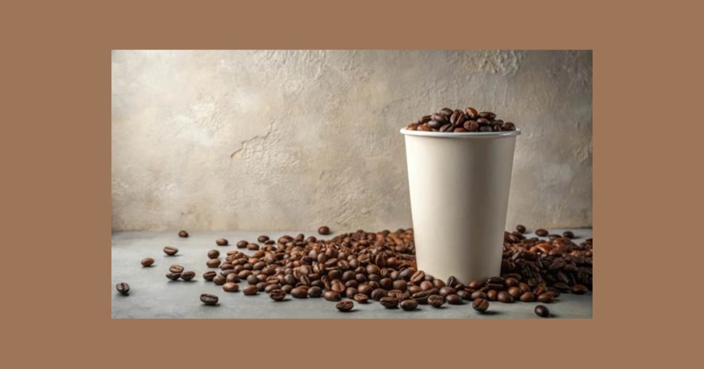 A coffee cup fill to overflowing with coffee beans